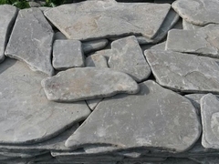 Камень серый галтованый